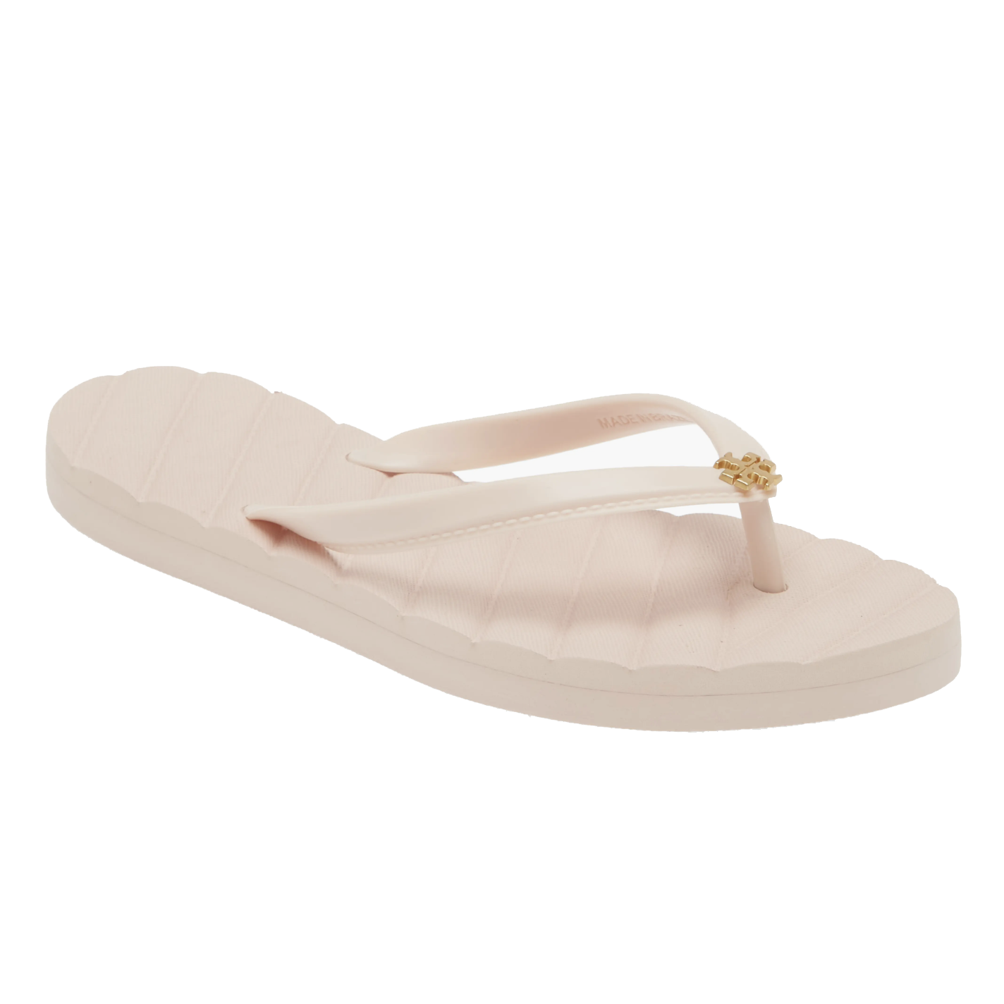 Tory Burch Kira Flip Flops feature a light pink, scalloped-edge sole with matching straps. They are adorned with a small metallic logo at the toe post for a subtle touch of elegance.