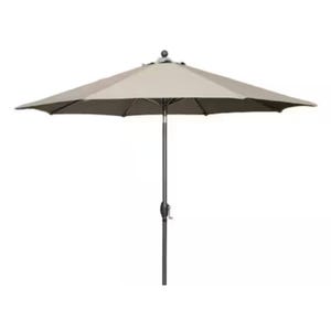 A beige patio umbrella with a round canopy and a crank mechanism on a central pole.