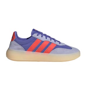 Adidas Barreda Shoes in a vibrant design featuring purple and red uppers with signature three stripes. They have a light, translucent rubber sole and lace-up closure, offering a sporty and contemporary look.
