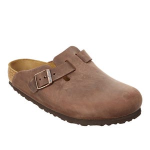 Brown leather closed-toe clog with a single adjustable buckle strap, cork footbed, and textured dark brown sole.
