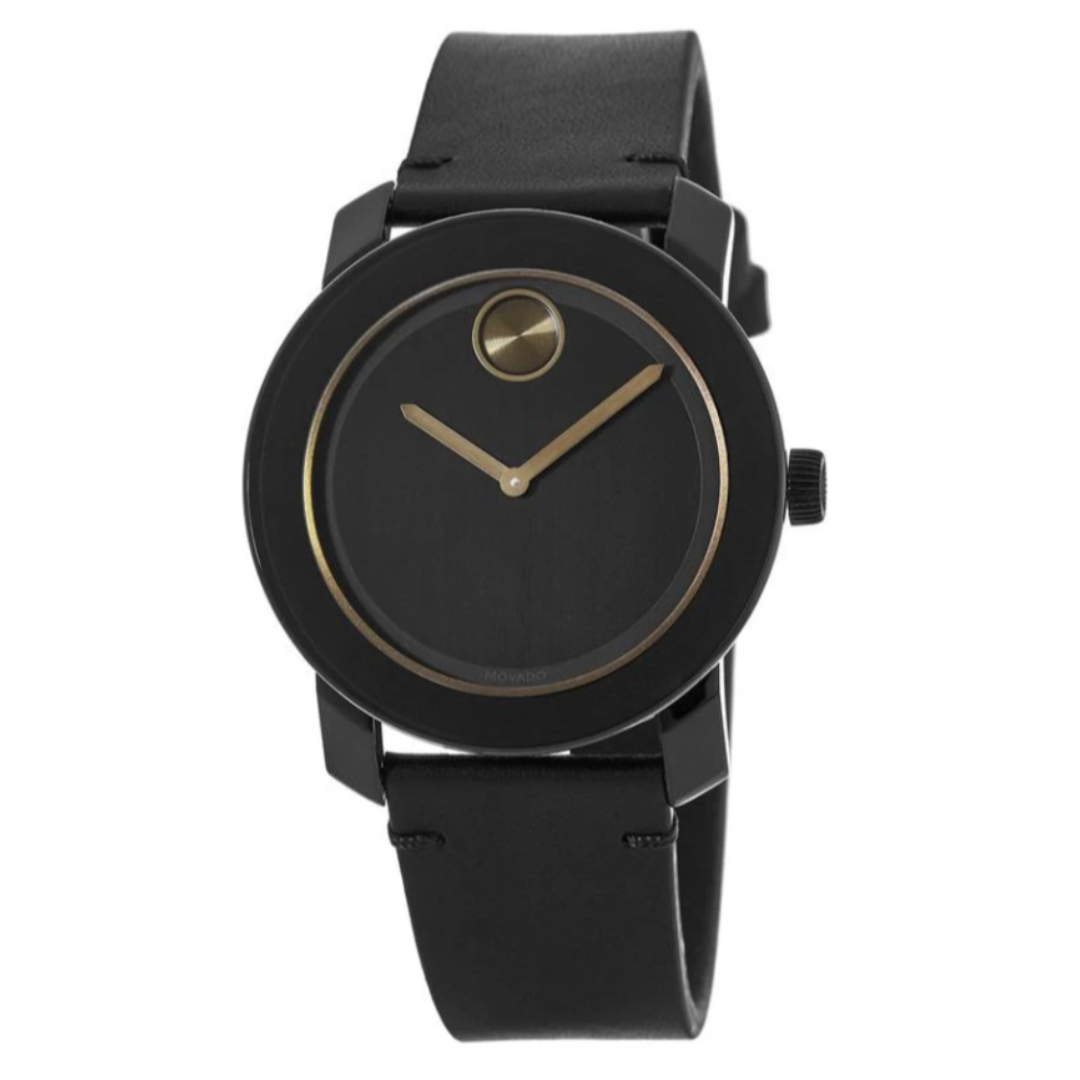 Sleek black watch with a minimalist design, featuring a black leather strap and a black round face with gold hands and a single gold dot at 12 o'clock.