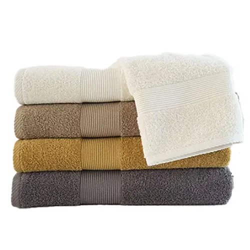 A stack of five folded towels in cream, taupe, mustard, and gray colors, with ribbed decorative bands.