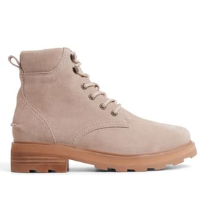 A beige suede ankle boot with lace-up closure, a small heel, and a rugged rubber sole for traction.