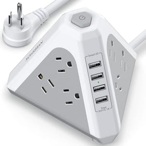 A white, triangular power strip with a power button, featuring multiple AC outlets and four USB ports labeled \“Smart ID,\“ with a power rating of 5V/3.1A total.