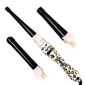 A curling wand with a leopard print handle and two interchangeable black barrels.