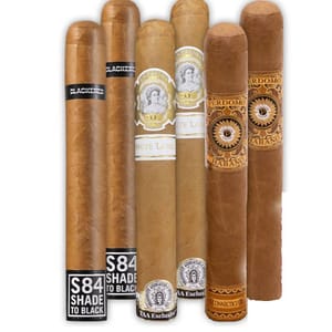 Assorted cigars featuring Blackbird, La Palina White Label, and Perdomo Habano Connecticut, each with distinctive bands and packaging.