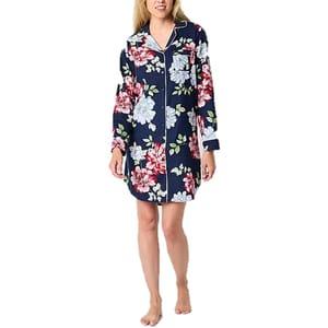 Women's nightshirt with a floral print featuring large red, white, and blue flowers on a navy background, button-down front, and a collar.