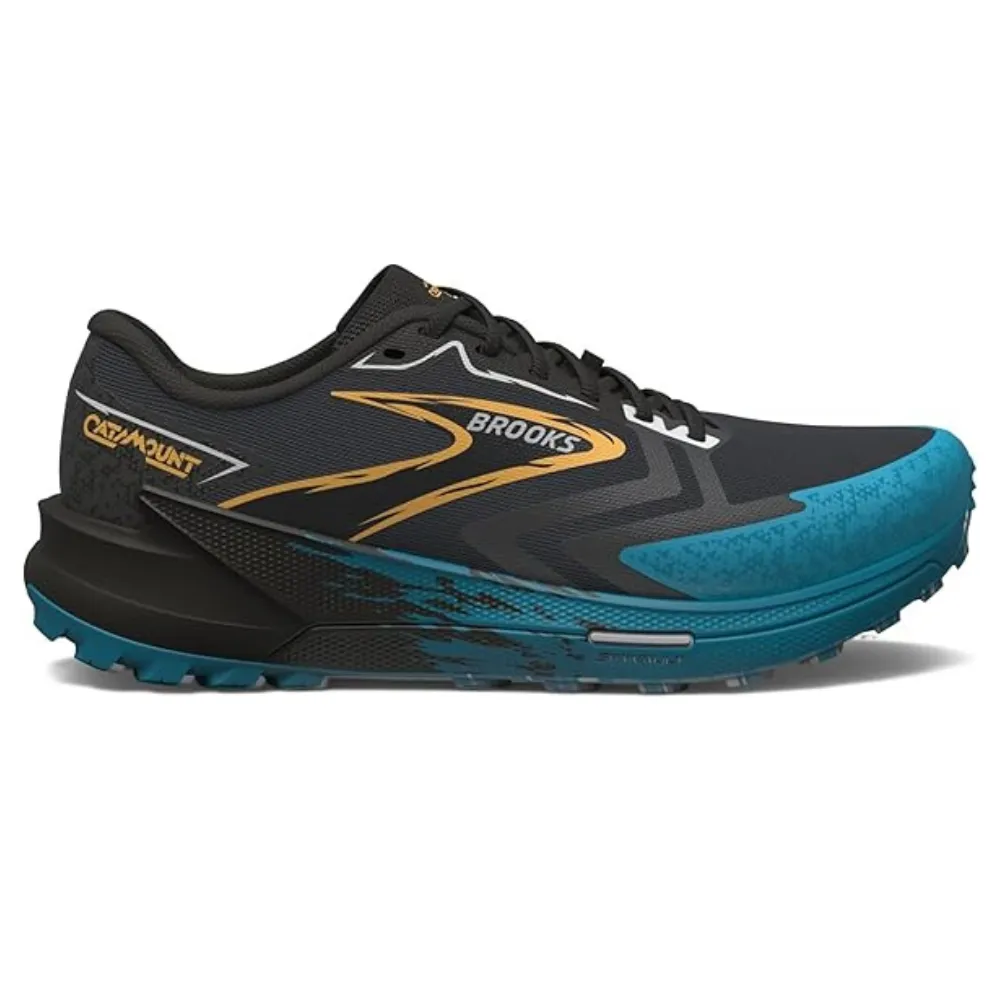 Brooks Catamount running shoe in black with blue and gold accents, designed for trail running, featuring a rugged outsole and cushioning.
