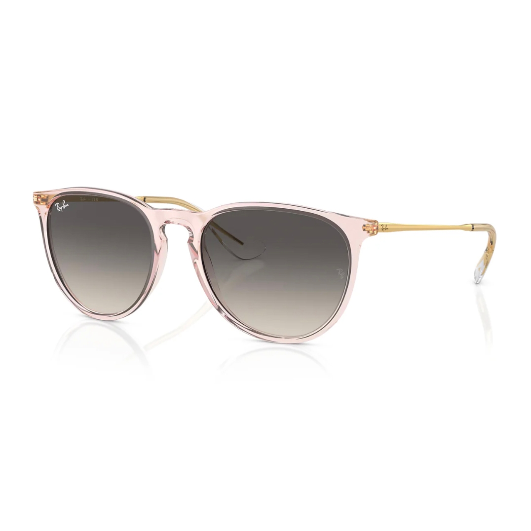 Pink sunglasses with a transparent frame and gold temples, featuring gradient lenses.