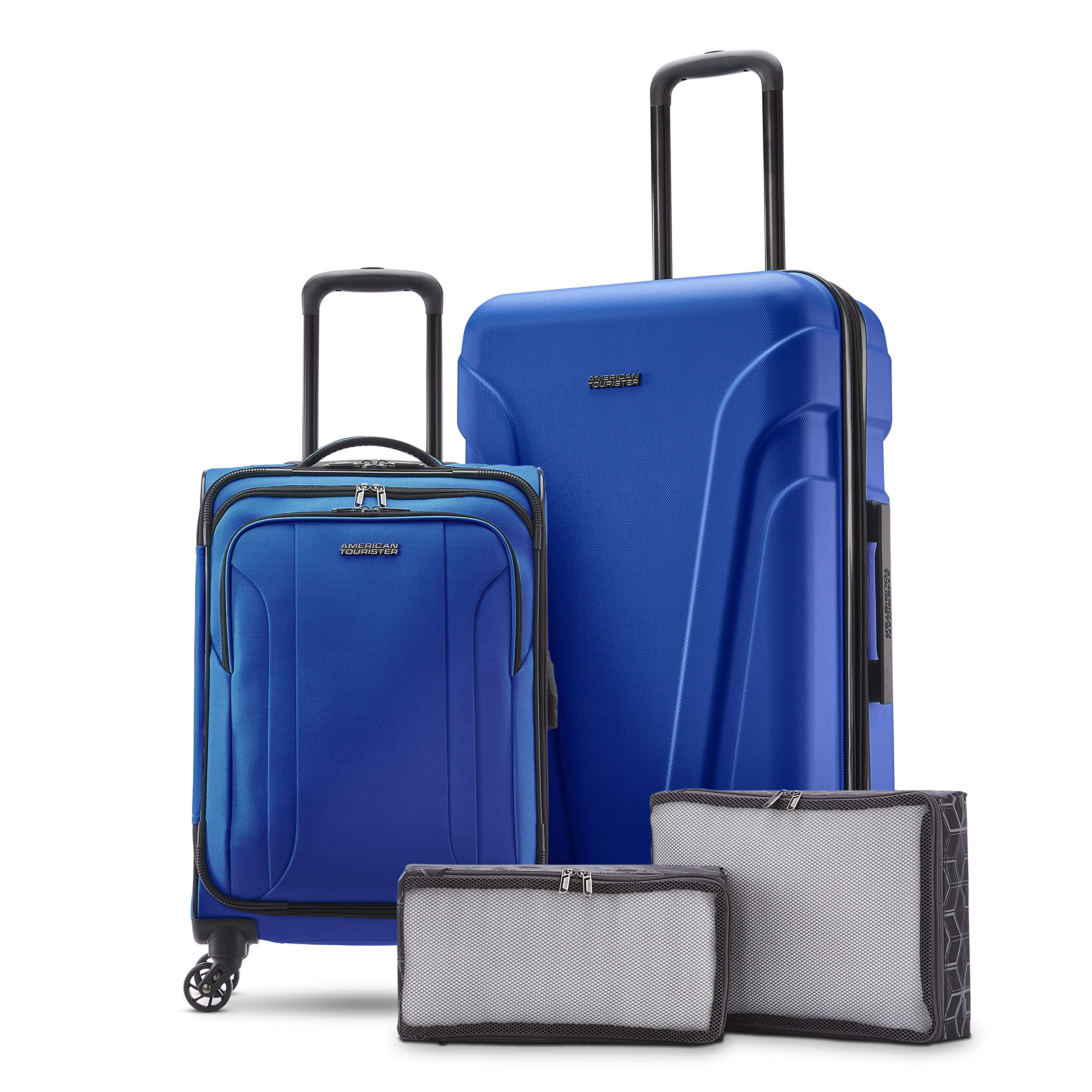 A four-piece luggage set featuring two blue suitcases, one with wheels and telescoping handle, and two grey packing cubes of different sizes.