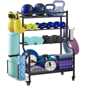 Lugo Heavy Duty Storage Weight Rack holds various fitness equipment: kettlebells, dumbbells (1kg to 4kg), medicine balls (1kg, 5kg), yoga mats, foam roller, exercise pads, and ab wheels, organized on a black metal rack with caster wheels for mobility.