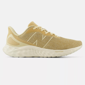 Beige New Balance Fresh Foam Arishi shoes with a textured mesh upper, cream accents, and chunky white soles.