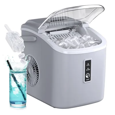 Portable ice maker with a transparent lid, capable of producing 26 pounds of ice, featuring a control panel for \“Ice Full\“ and \“Add Water\“ indicators. Includes a scoop for easy ice transfer next to a glass of blue beverage.