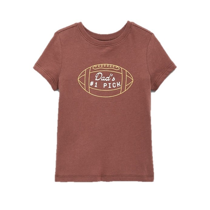 Brown children's T-shirt featuring a football graphic with the text \“Dad's #1 Pick.\“