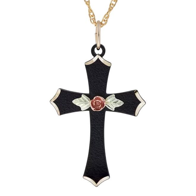 A black cross pendant features a rose and leaf embellishment, with gold accents on the edges, hanging from a gold chain.
