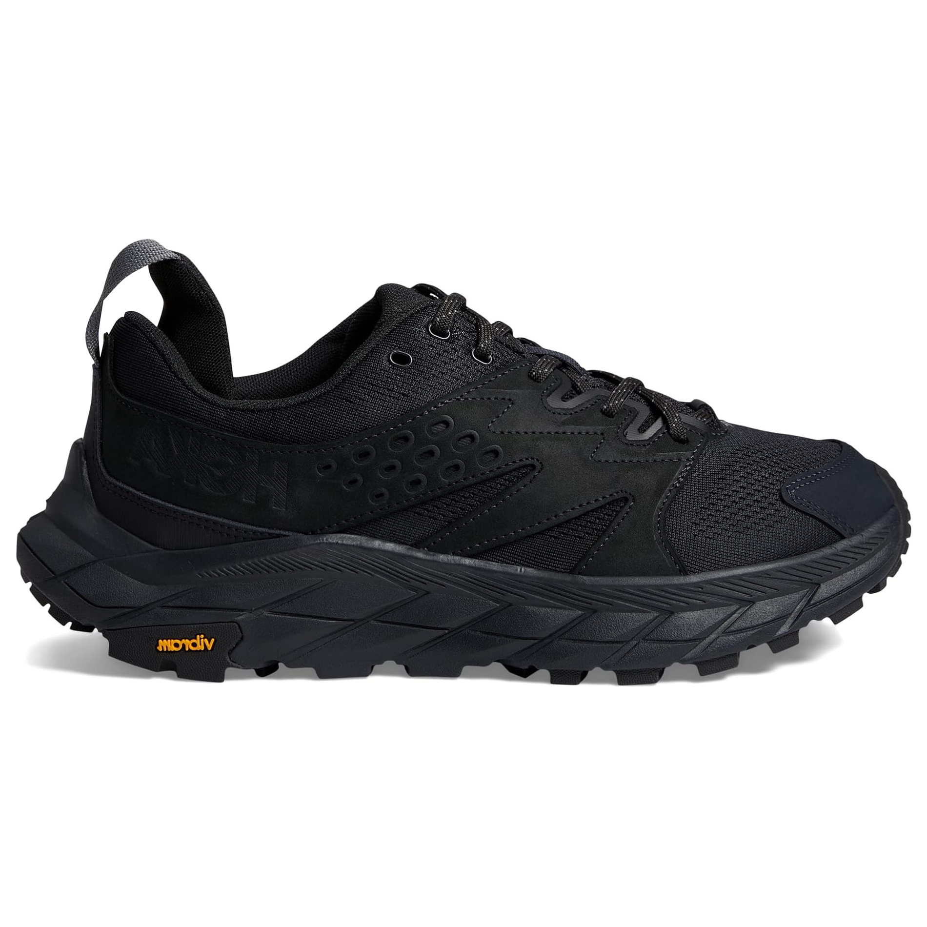 Black athletic shoe with a textured design and chunky sole.