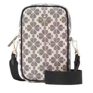 A rectangular crossbody phone bag with a black and white clover pattern, featuring a detachable black strap and gold-tone hardware, including a zipper and clasps.