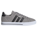 Gray Adidas sneaker with black stripes, featuring a textured upper and a white rubber sole.