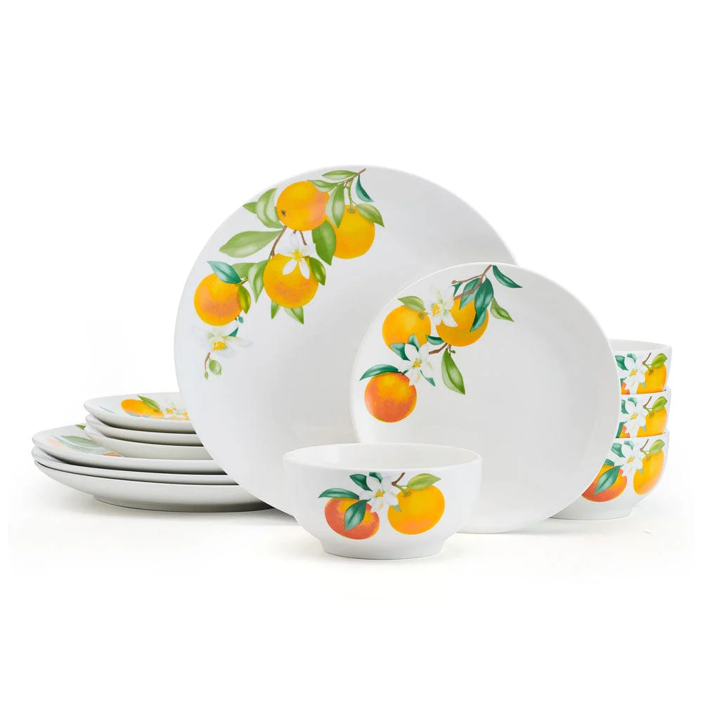 A dinnerware set featuring plates and bowls with a bright orange and leaf design on a white background.