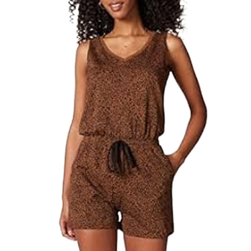 A woman is wearing a sleeveless, brown patterned romper with an elastic waistband and drawstring, featuring side pockets.