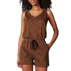 A woman is wearing a sleeveless, brown patterned romper with an elastic waistband and drawstring, featuring side pockets.