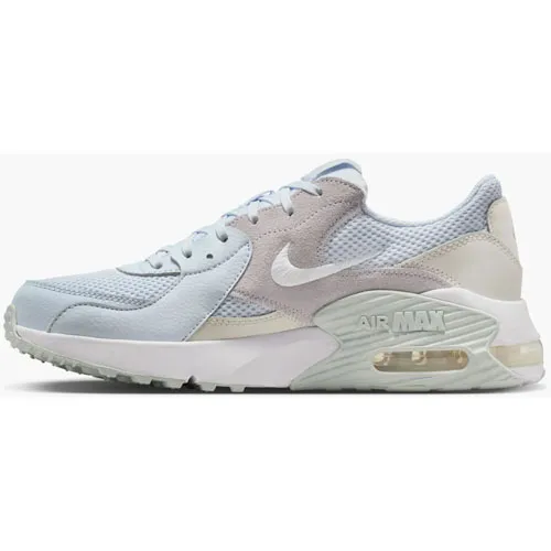 A light blue and beige Nike Air Max sneaker featuring mesh and suede materials, with a visible air unit in the sole.