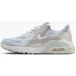 A light blue and beige Nike Air Max sneaker featuring mesh and suede materials, with a visible air unit in the sole.