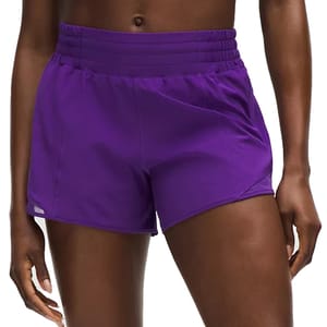 Vibrant purple athletic shorts featuring a high elastic waistband and a comfortable, loose fit.