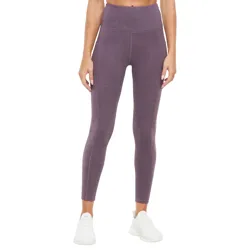 High-waisted purple leggings with side pockets, paired with white athletic sneakers.