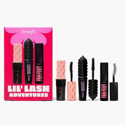 Three Benefit Cosmetics mascaras, two full-sized and one mini, are displayed with their packaging, featuring a black and pink color scheme.