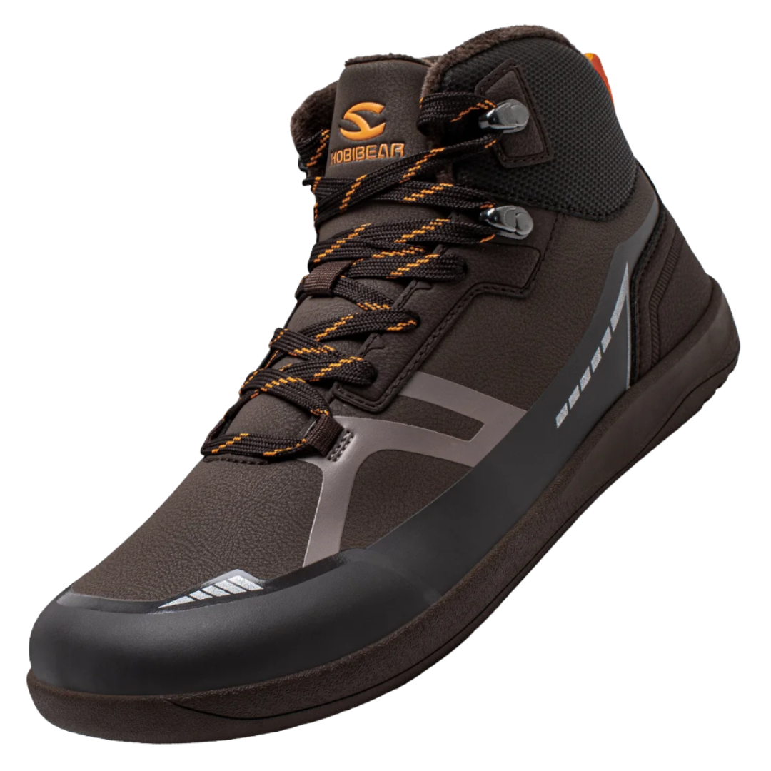 A brown high-top sneaker with orange and black laces, featuring reflective accents and branding.