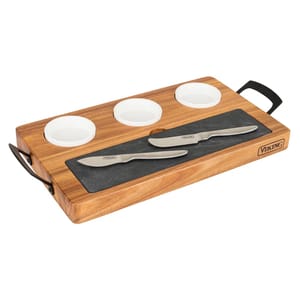 7pc Viking Wood Slate Charcuterie Set includes a wooden serving board with metal handles, a slate insert, three white ceramic bowls, and two stainless steel cheese knives, all designed for elegantly displaying and serving appetizers.