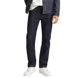 Dark denim jeans paired with a matching denim jacket and white sneakers.