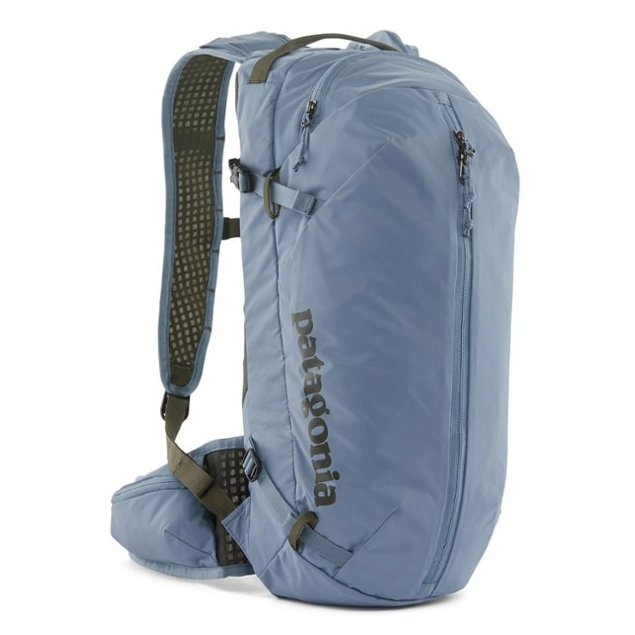 A light blue Patagonia backpack with multiple zippers and adjustable straps.