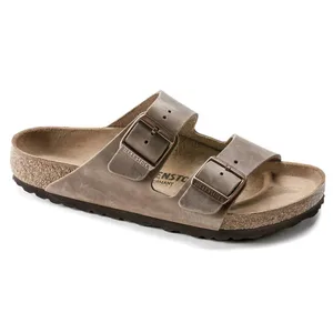 Brown Birkenstock sandal with two adjustable straps and a contoured cork footbed.