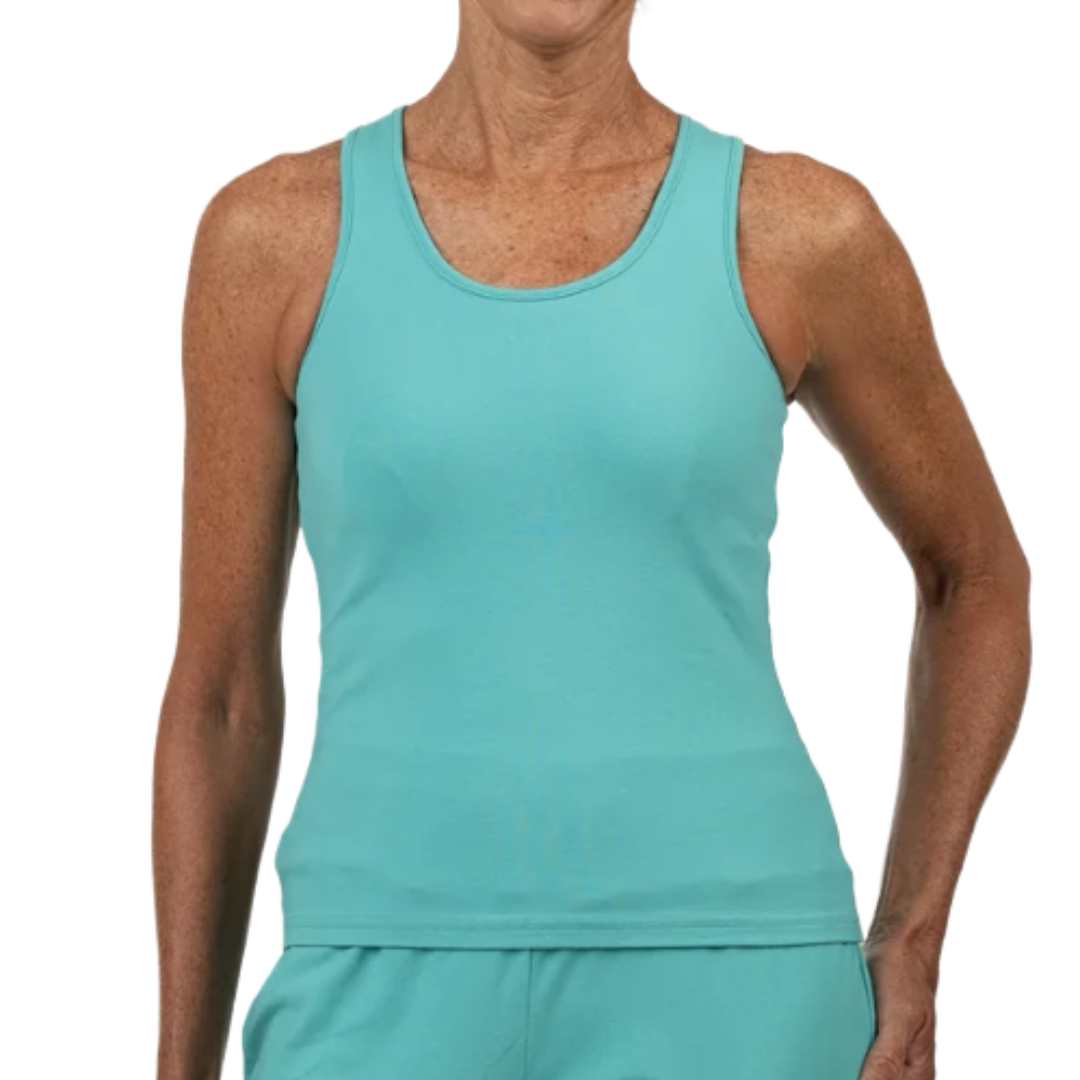 A person is wearing a turquoise tank top and matching shorts.