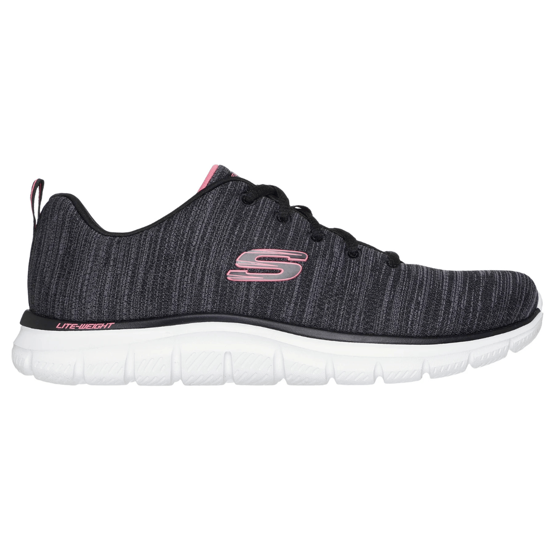 A black and white athletic shoe with a pink \“S\“ logo and \“Lite-Weight\“ text on the outer sole, featuring a cushioned white sole and dark fabric upper.