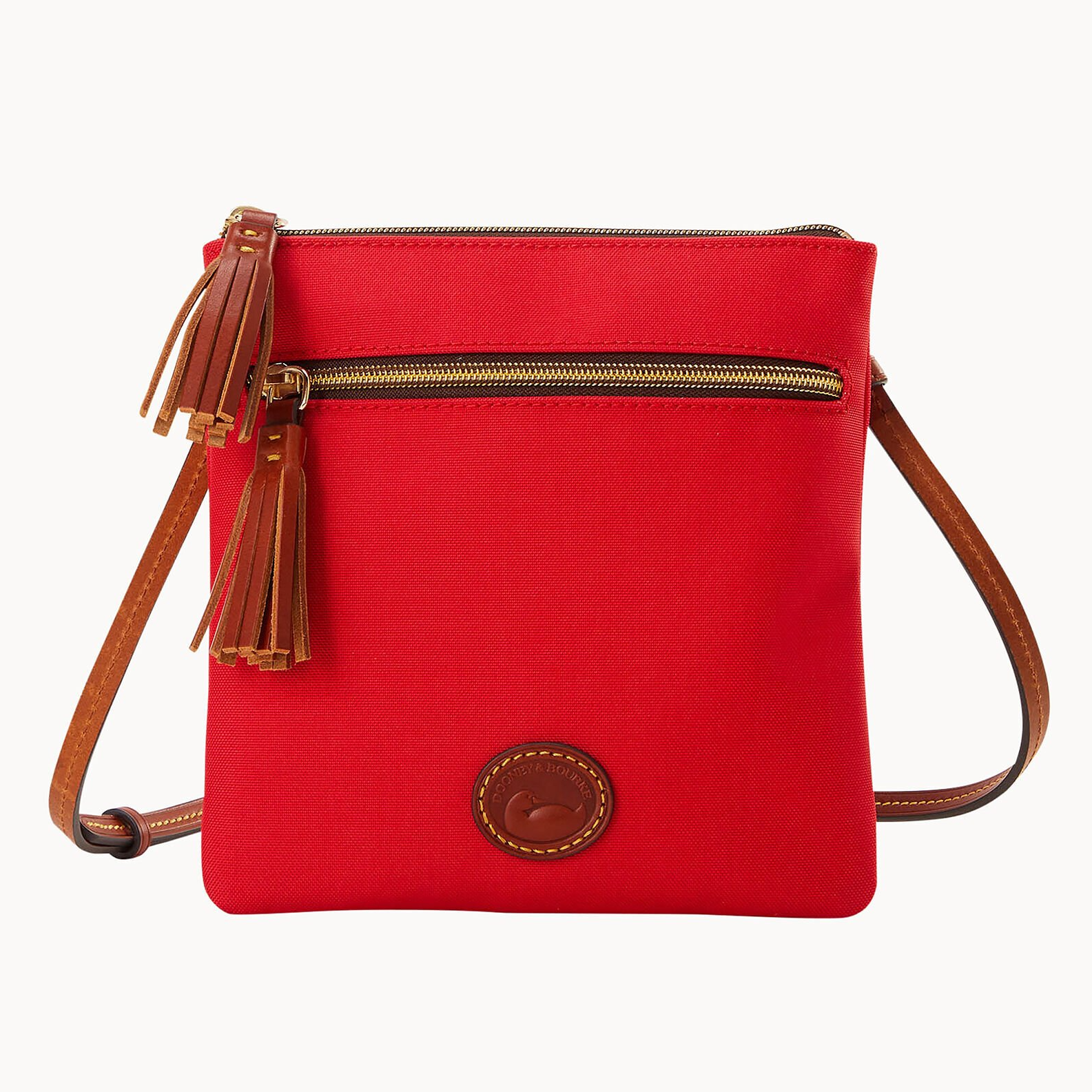 Red crossbody bag with gold zipper and brown leather tassel.