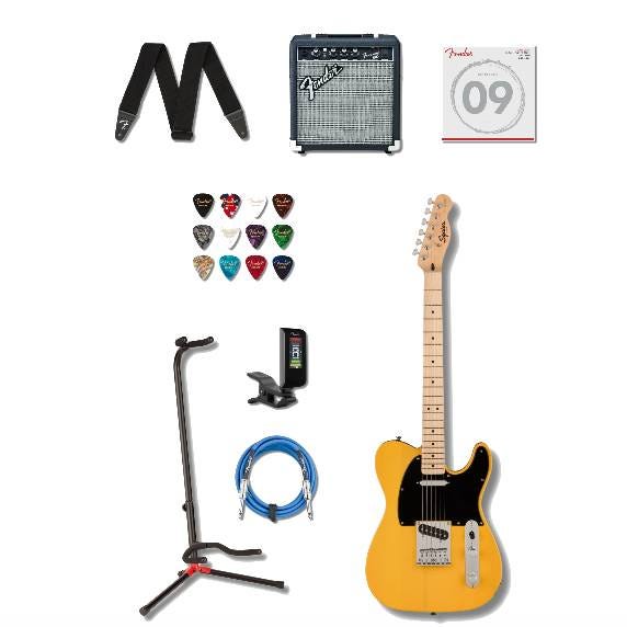 Guitar bundle including a yellow electric guitar, amplifier, set of strings, picks, strap, stand, tuner, and blue cable.