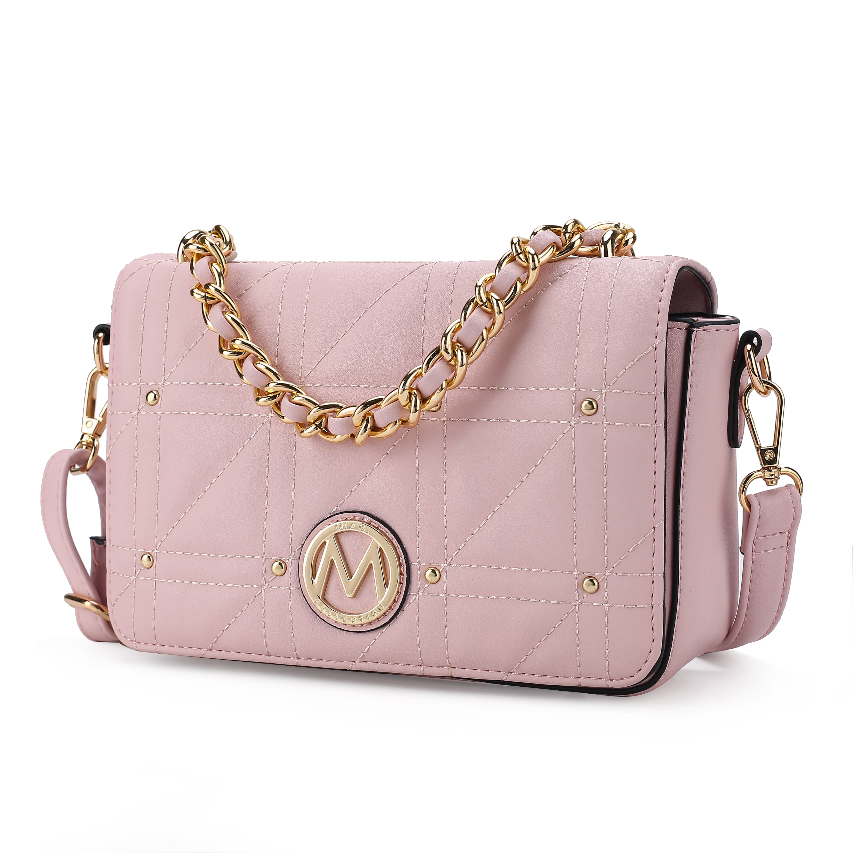 A pink faux-leather quilted crossbody bag with a gold chain strap and clasp. Features an \“M\“ emblem on the front, with additional strap attachments for versatility.