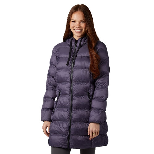 A person wearing a long, dark purple hooded puffer jacket with horizontal quilting and zippered pockets.