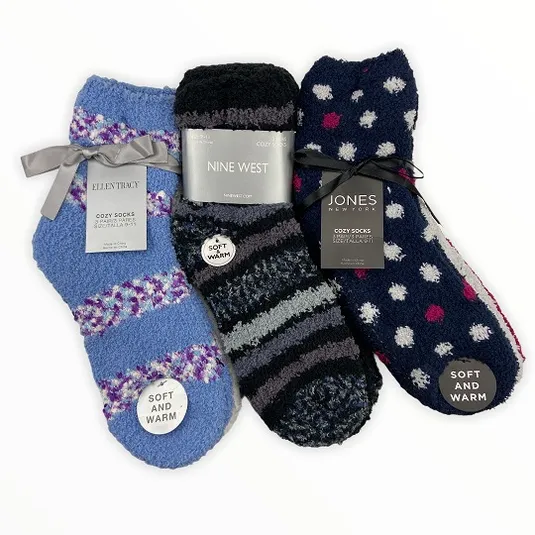 Three pairs of cozy, soft, and warm socks from Ellen Tracy, Nine West, and Jones New York, each with unique patterns: blue with purple stripes, black and gray stripes, and navy with pink and white polka dots.