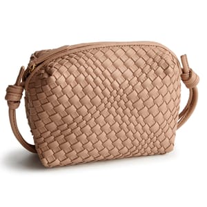 The Vera Bradley Blake Crossbody is a compact woven purse with a structured design, featuring a top zip closure and adjustable strap. The neutral color complements a variety of outfits.