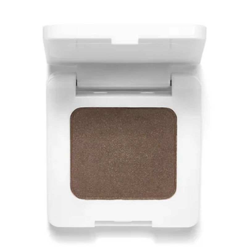 A compact featuring brown brow powder in a white case, designed for defining and filling in eyebrows.