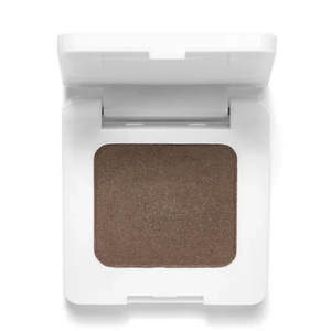 A compact featuring brown brow powder in a white case, designed for defining and filling in eyebrows.