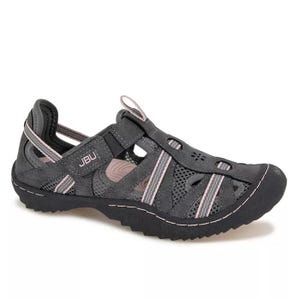 A black sport sandal with pink accents, featuring a closed toe, breathable mesh, and adjustable straps. The design appears to offer comfort and support, suitable for outdoor activities.
