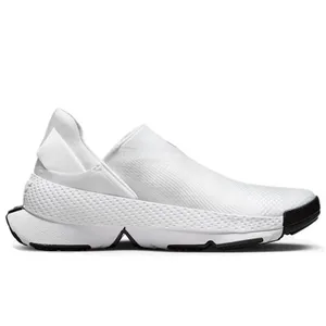 A white slip-on athletic shoe with a sleek design and a textured surface, featuring a black sole and toe cap.