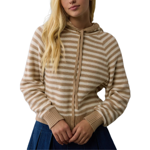 A beige and white striped, cropped cotton hoodie with ribbed cuffs and a zip front, paired with a blue skirt.