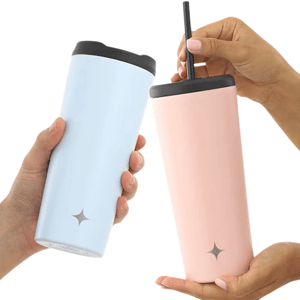 Two insulated tumblers, one light blue and the other pink, each with a black lid and straw, featuring a small star design.