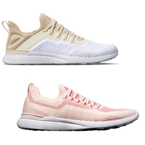Two pairs of athletic sneakers, one in white and beige and the other in a light pink shade.